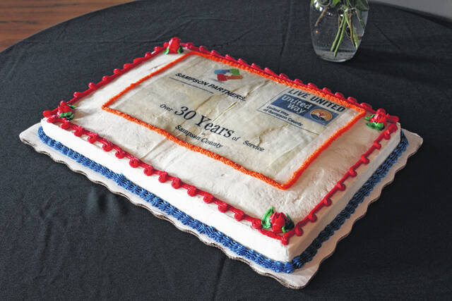 
			
				                                This huge cake was dedicated to the members of Sampson Partners and United Way for their over 30 years of service to Sampson County.
                                 Michael B. Hardison | Sampson Independent

			
		
