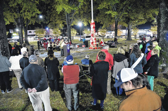 
			
				                                The names of honorees are read as part of Newton Grove’s Circle of Lights celebration. The annual event returns this year on Nov. 28 starting at 6 p.m. at the roundabout. Christmas in the Grove will also be happening that day. It will extend from Nov. 28-30.
                                 File Photo

			
		