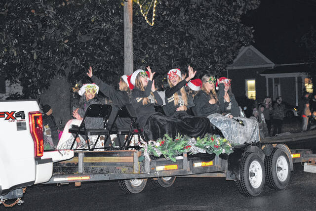 <p>Hands wave from excited faces during last year’s Christmas Parade in Roseboro. The parade will take place on Dec. 9, following the Christmas Tree Lighting event the preceding week, on Dec. 1.</p>
                                 <p>File Photo</p>