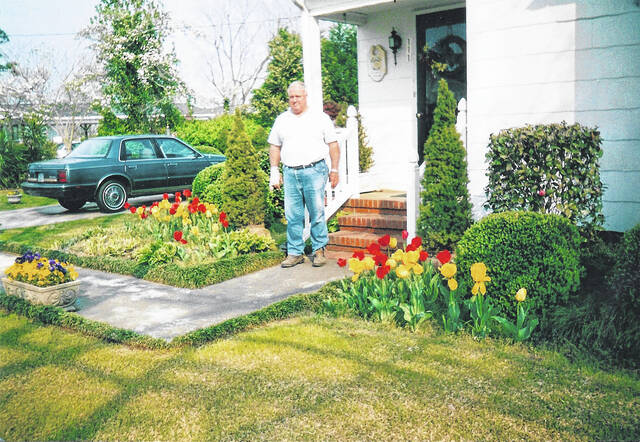 <p>George Dail outside his home. He was born, raised and lived in the same home for 78 years.</p>