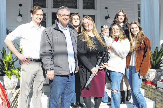 <p>The beautiful Rentz family were all smiles as they stood upon the steps of the Historic Herring House, their new home.</p>
                                 <p>Michael B. Hardison | Sampson Independent</p>