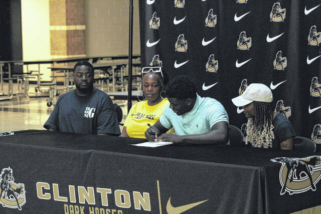 <p>Tairik Dyches signs a letter of intent with Allen University.</p>
                                 <p>Anthony McConnaughey|Sampson Independent</p>